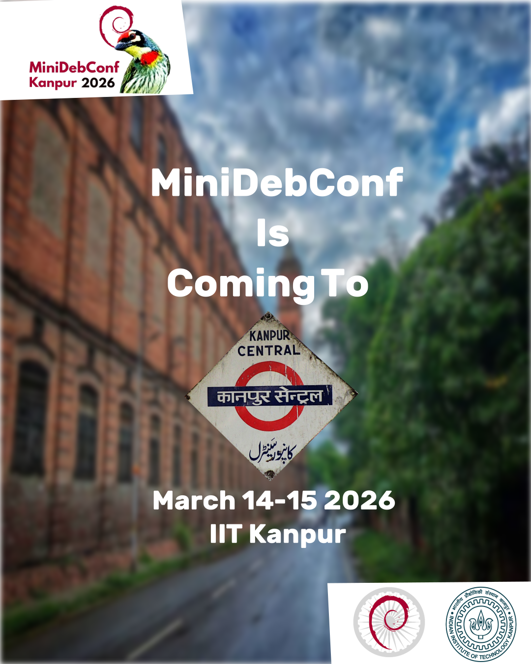 On the top left, there is a bird with Debain swirl logo coming out of its mouth. Besides the bird "MiniDebConf Kanpur 2026" is written. 

In the center of poster, "MiniDebConf is coming to" is written followed by "Kanpur Central railway station board". Below that, the text says "March 14-15 2026 IIT Kanpur".

In the background, a building can be seen with sky and clouds on the top and green trees on the right.

In the bottom right corner is the Debian India logo with IIT Kanpur logo.